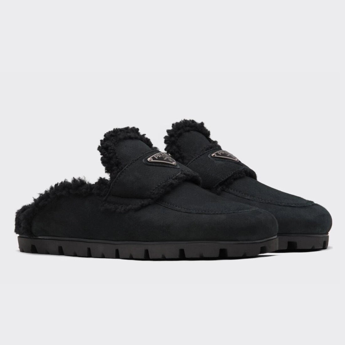 PRADA WOMEN’S SLIPPERS IN BLACK SHEARLING – PSD049