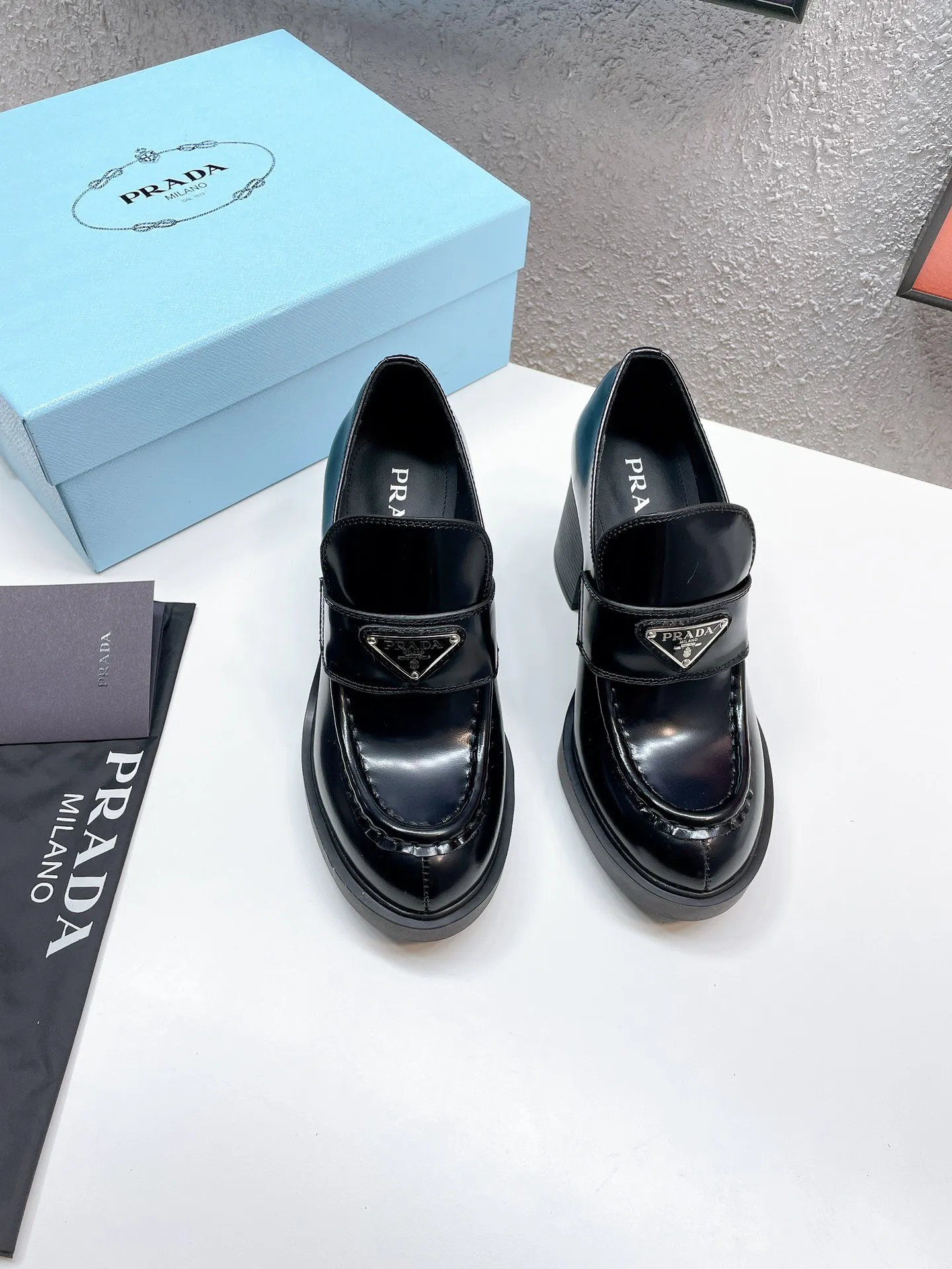 Prada Chocolate High-heeled Loafers In Black Brushed Leather – PRL001