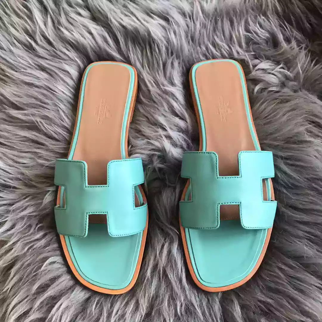 HERMES ORAN SLIDE SANDALS IN BLUE ATOLL SWIFT CALFSKIN – HMSD123