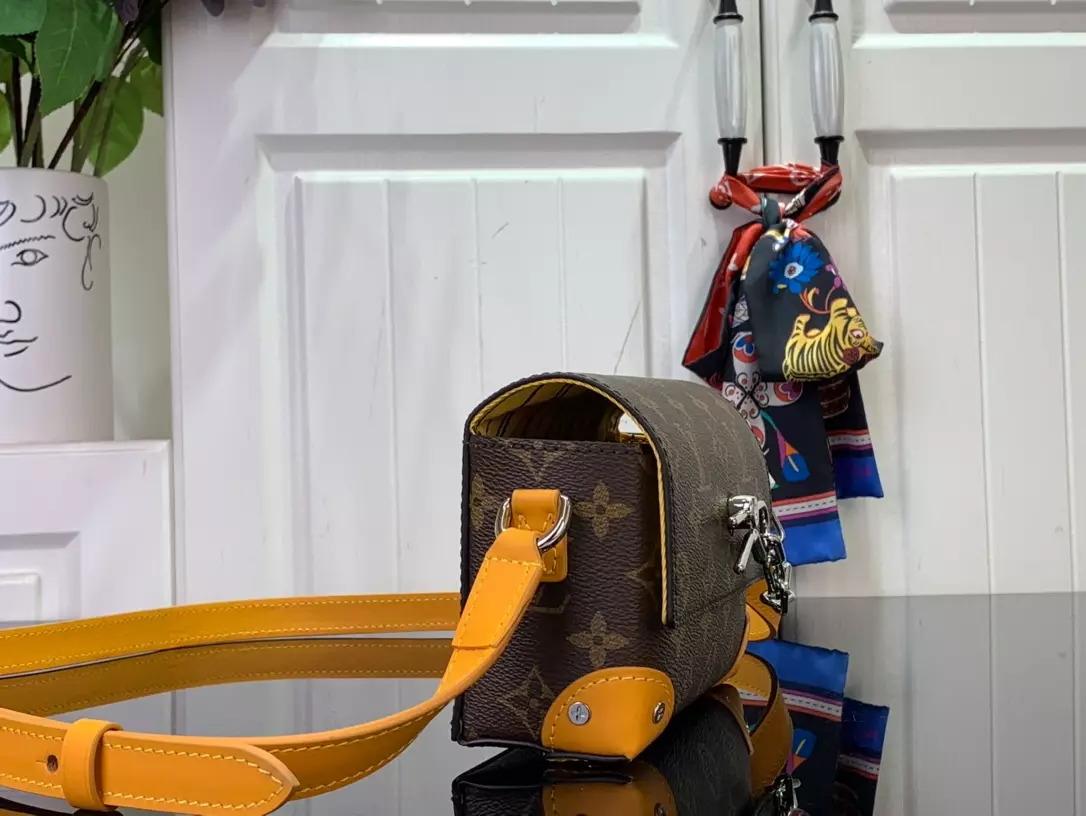 Louis Vuitton Steamer Wearable Wallet Yellow Safran Monogram Macassar – LW146