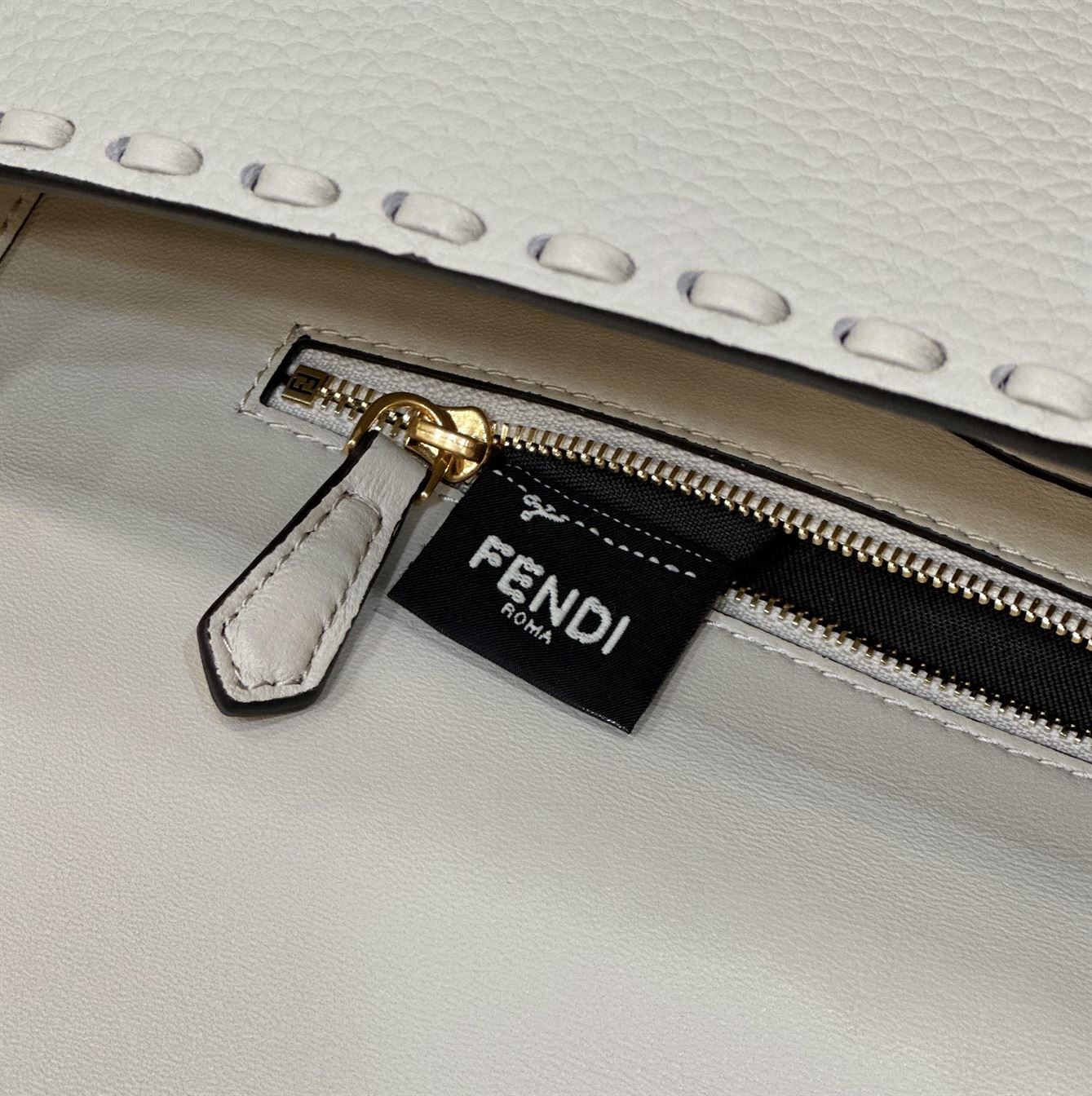 FENDI BAGUETTE CAMELLIA SELLERIA BAG WITH OVERSIZE TOPSTITCHING – F027