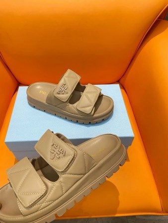 PRADA WOMEN’S SANDALS IN BEIGE PADDED NAPPA LEATHER – PSD024