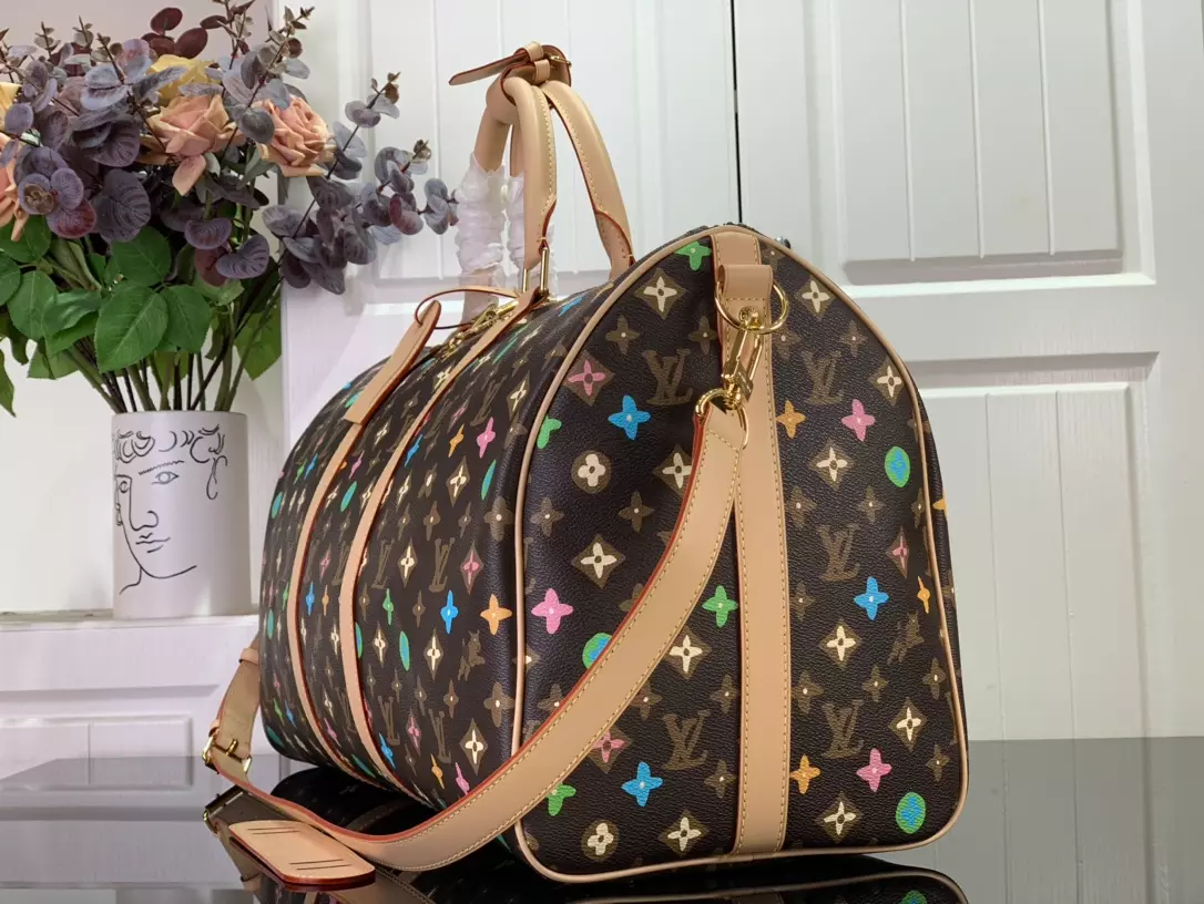 LV Keepall Bandoulière 50 Bag in Chocolate Monogram Craggy Coated Canvas – LW176