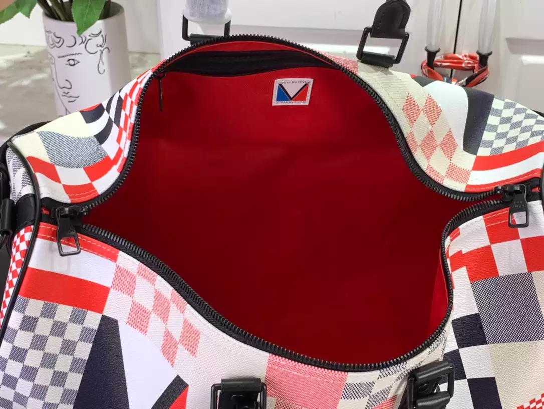LV Keepall Bandoulière 50 in Redblue Damier Flag Coated Canvas – LW179