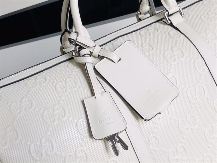 GUCCI GG EMBOSSED DUFFLE BAG – BG015