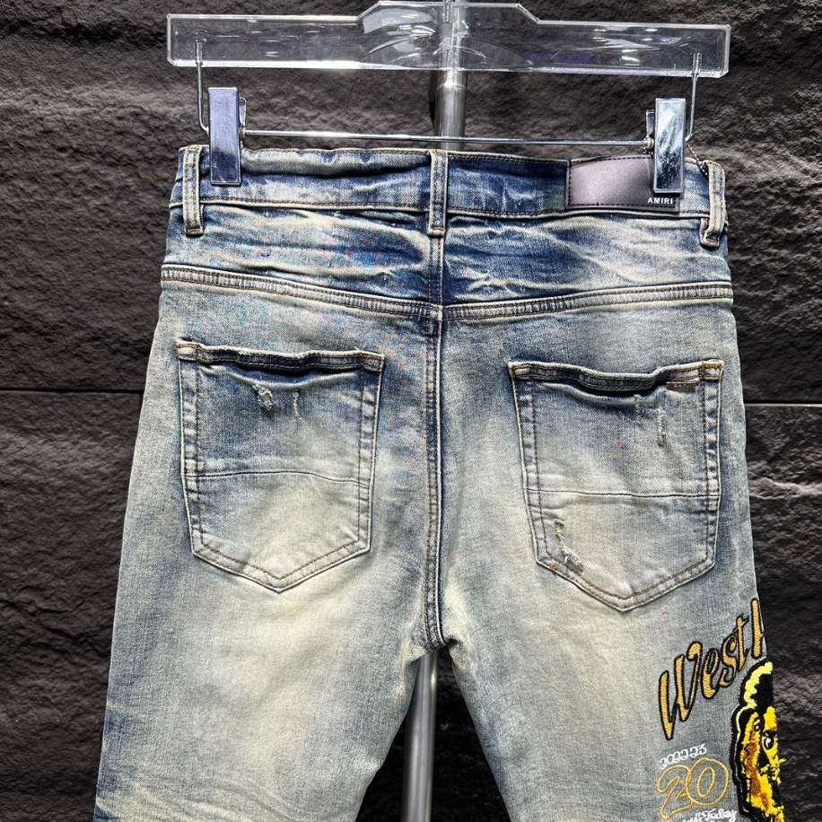 Amiri Ripp White Yellow Logo Jeans – AMIJ010