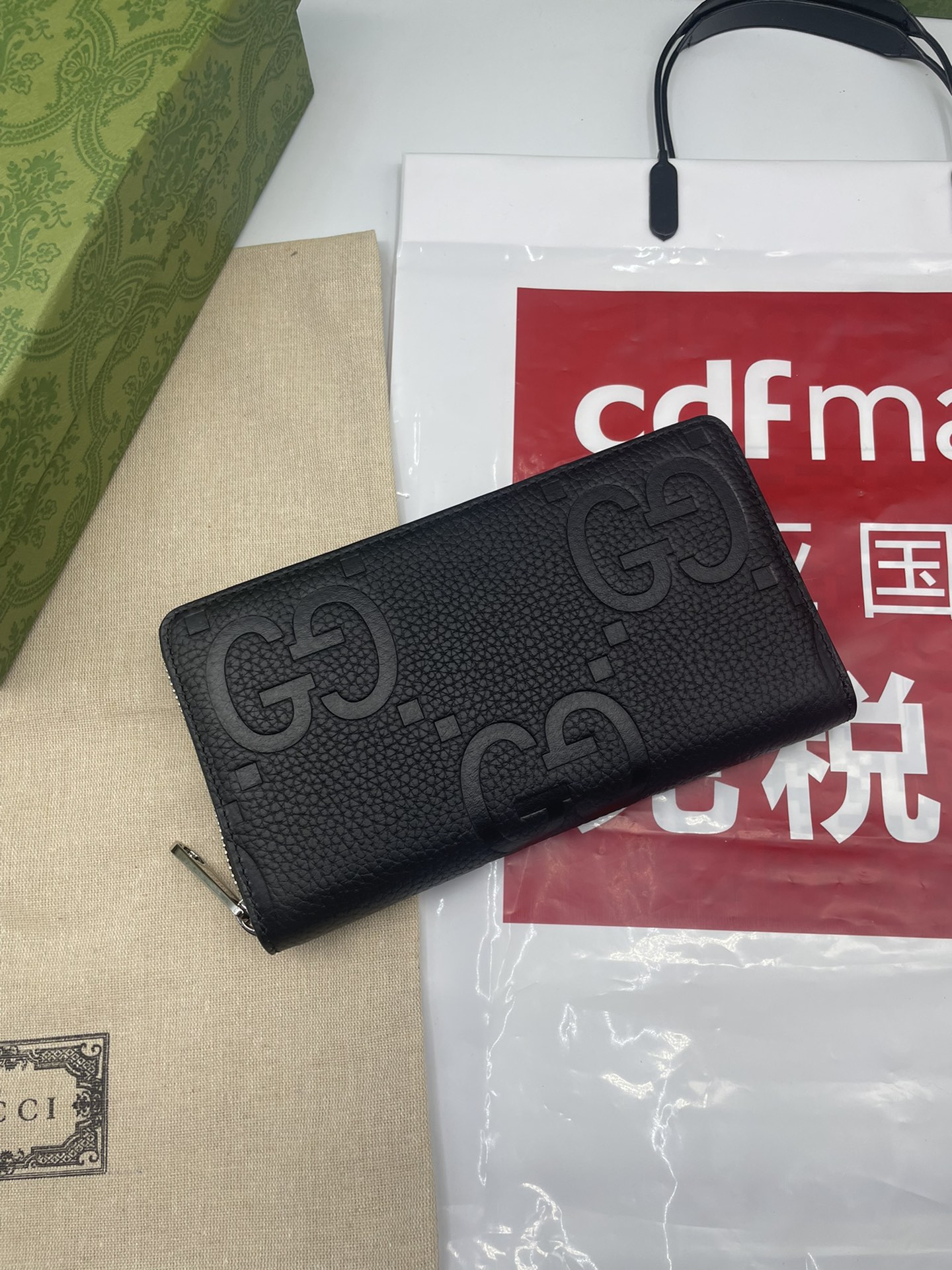 JUMBO GG ZIP AROUND WALLET BLACK LEATHER – WLG060