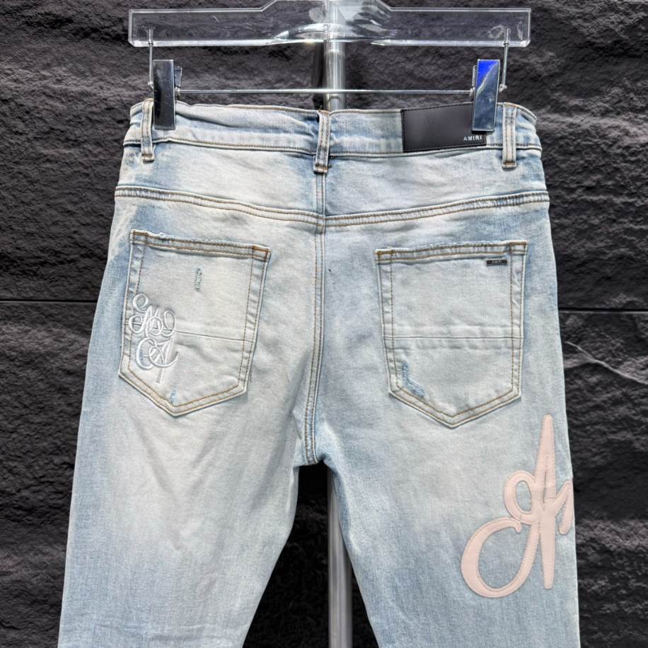 Amiri Men Blue Script Logo Jeans – AMIJ017