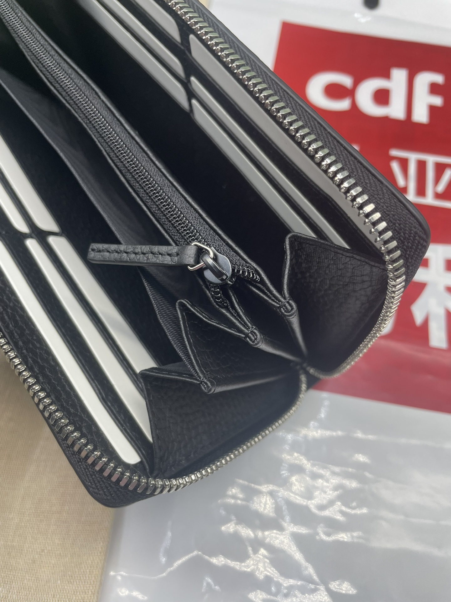 JUMBO GG ZIP AROUND WALLET BLACK LEATHER – WLG060