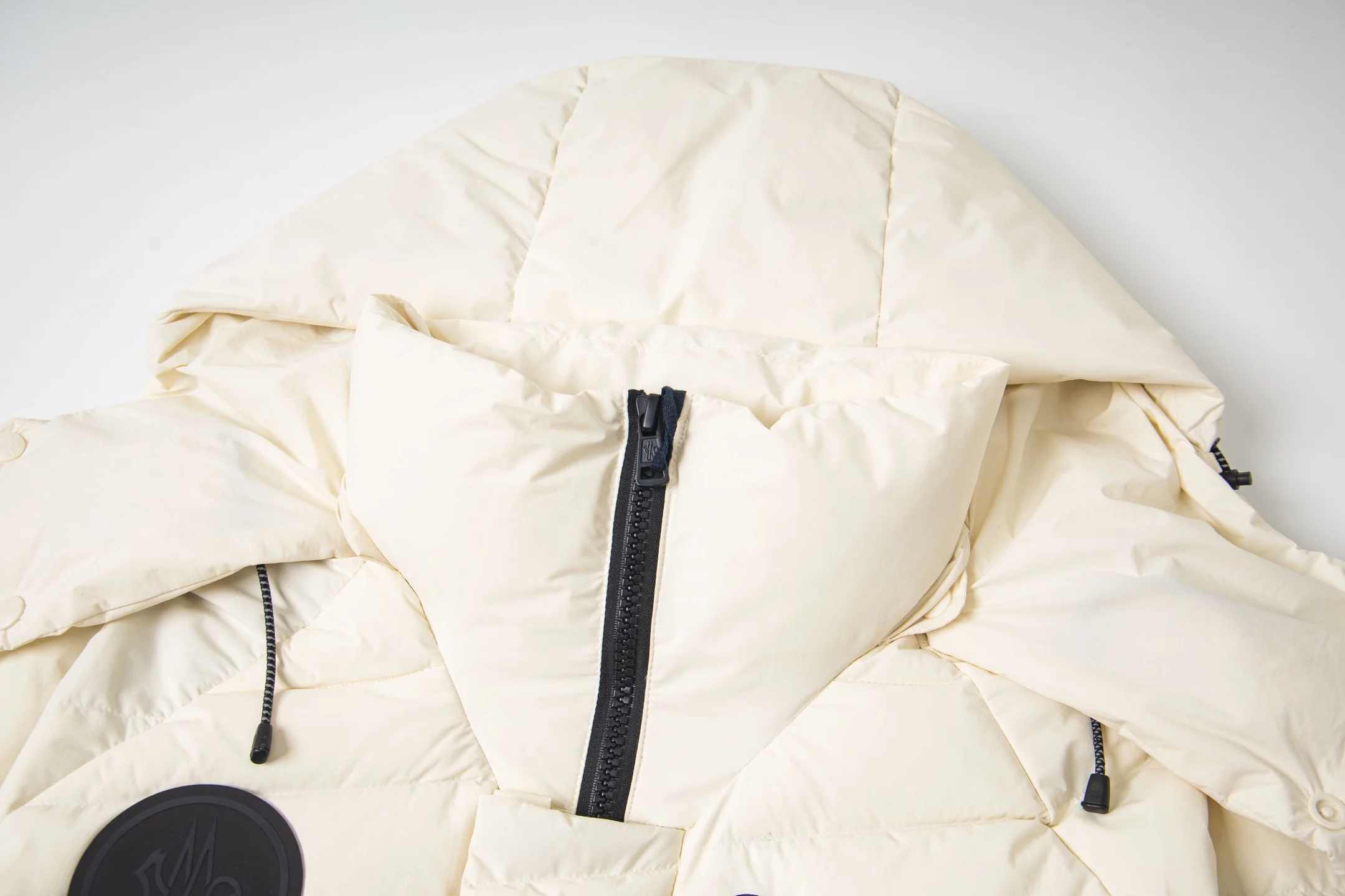 Printed rubber hooded down jacket