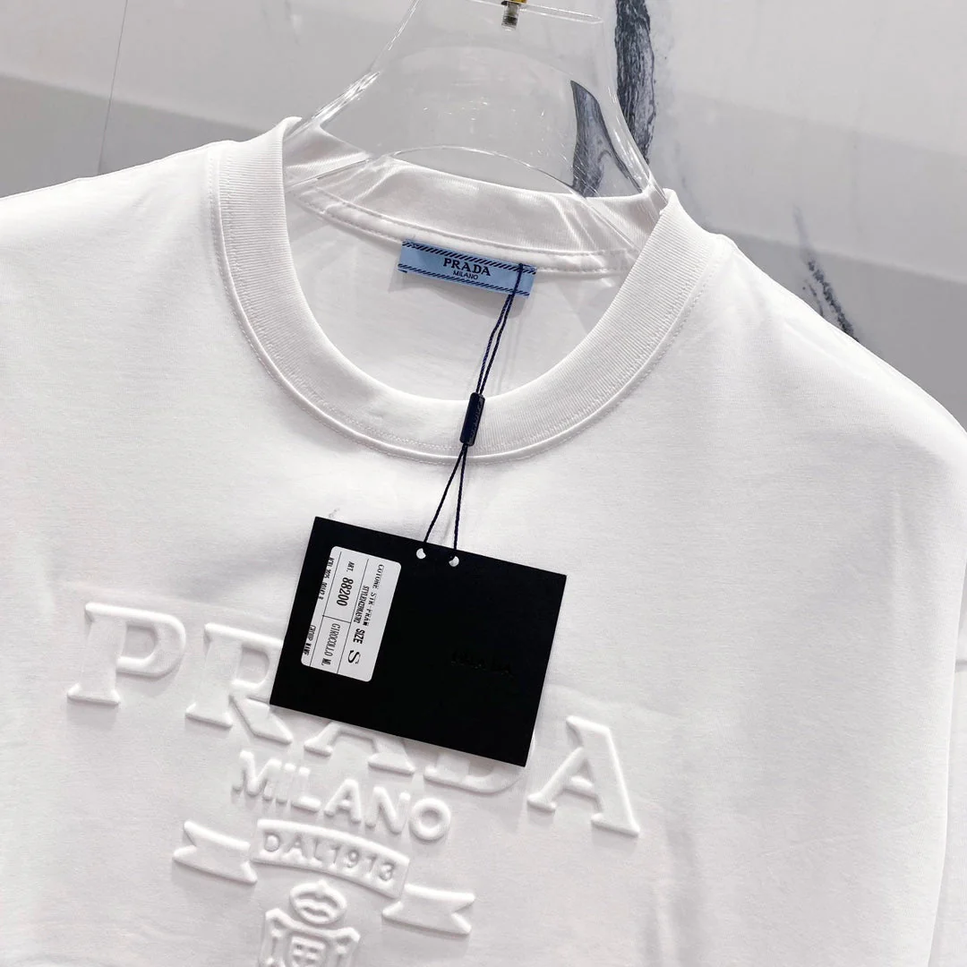 Three-dimensional embossed letter T-shirt