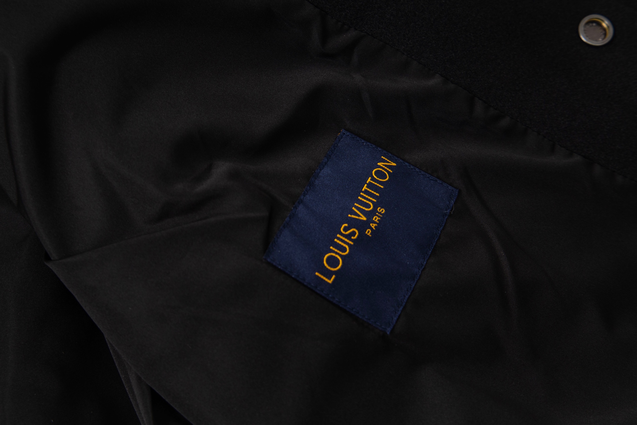 leather-paneled baseball jacket