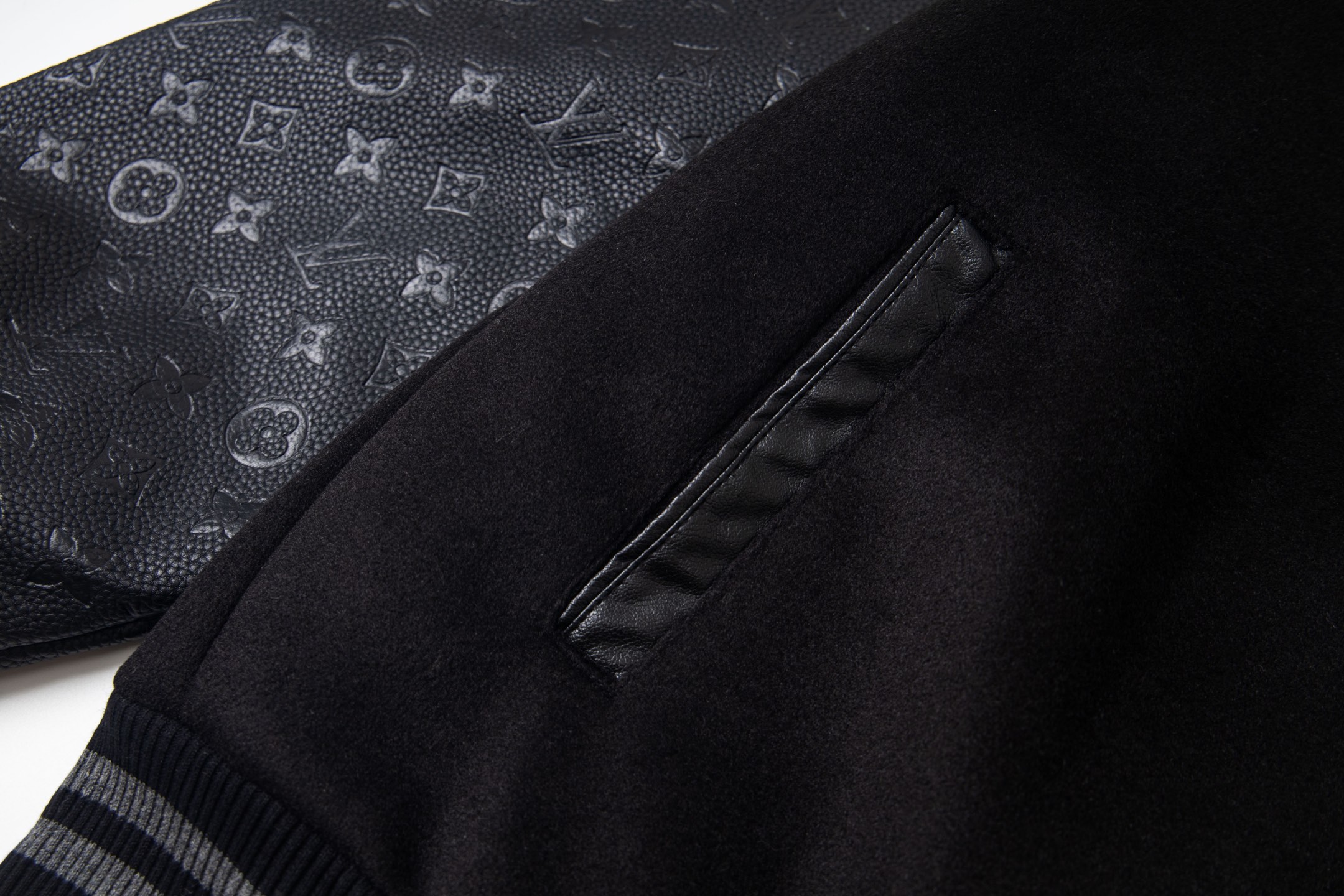 leather-paneled baseball jacket