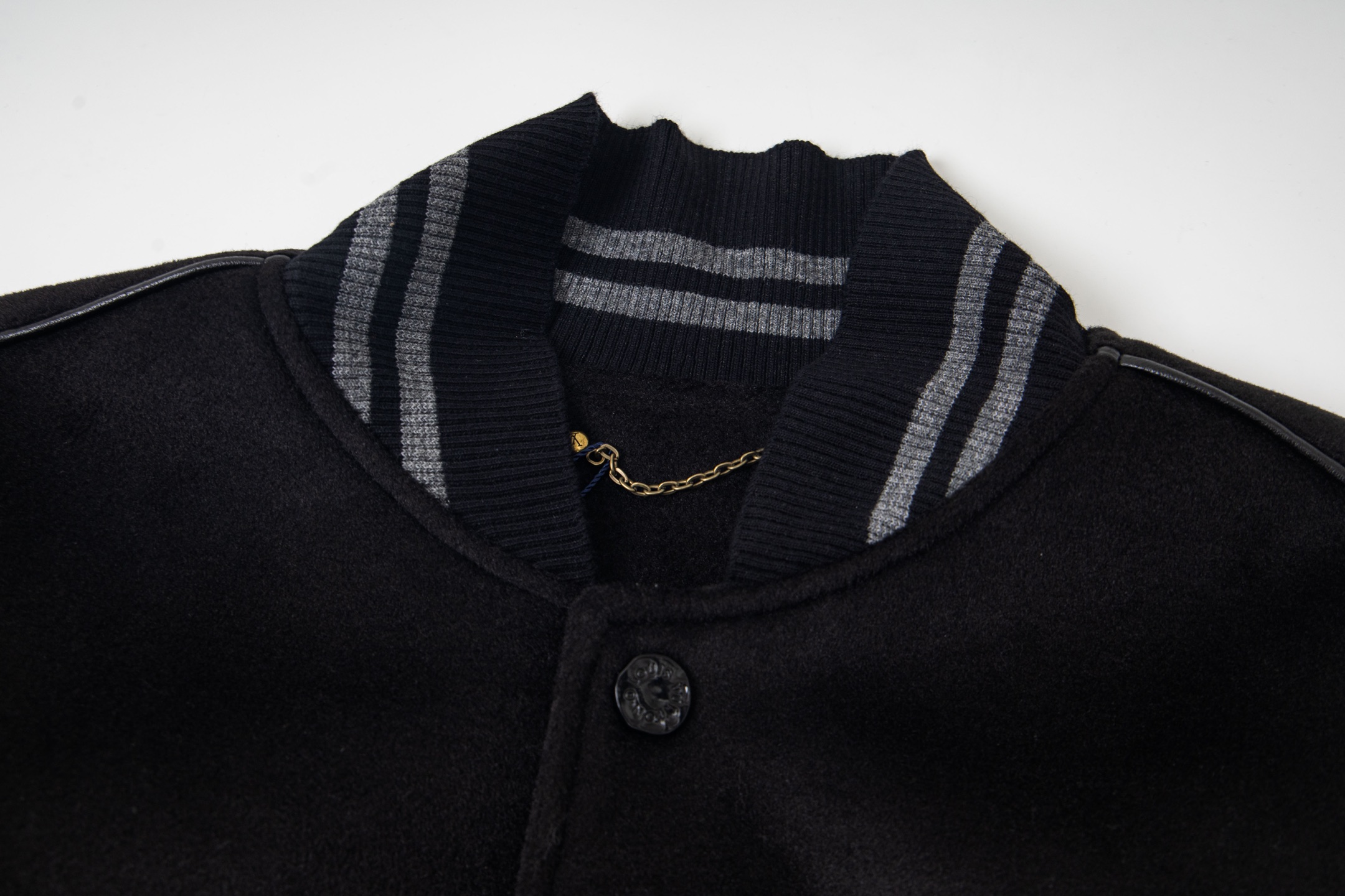 leather-paneled baseball jacket