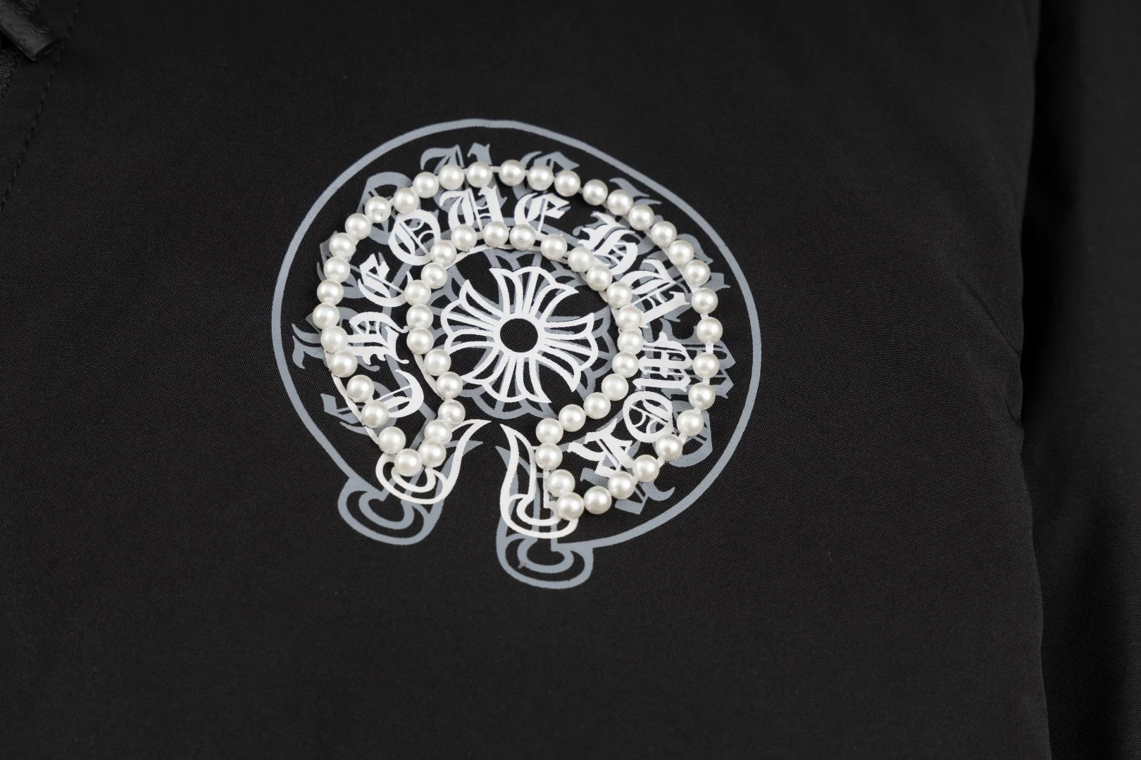 Fashionable embroidered pearl baseball jacket