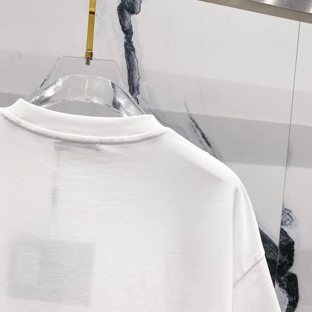 Three-dimensional embossed letter T-shirt