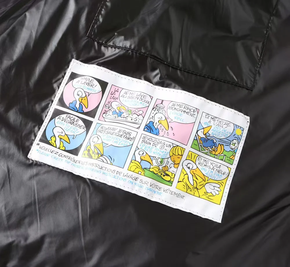 Embroidered hooded down vest