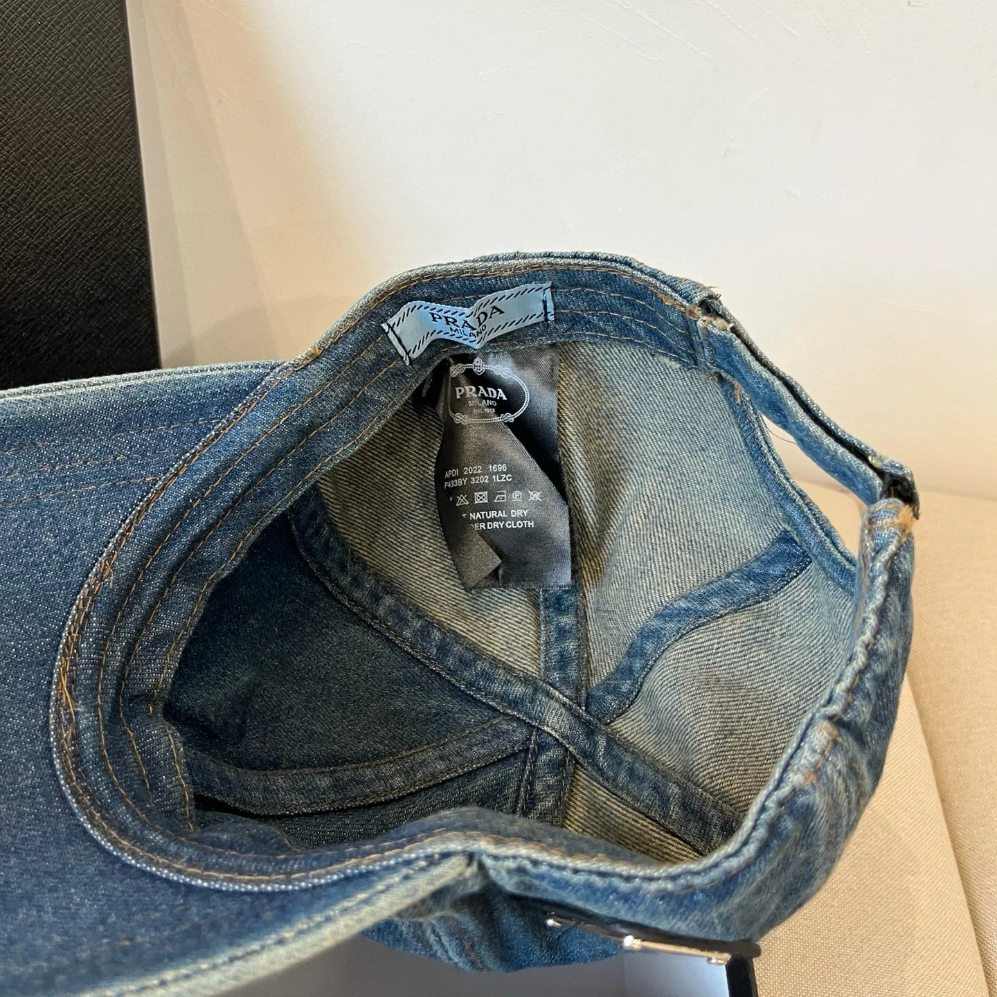 Distressed denim baseball cap