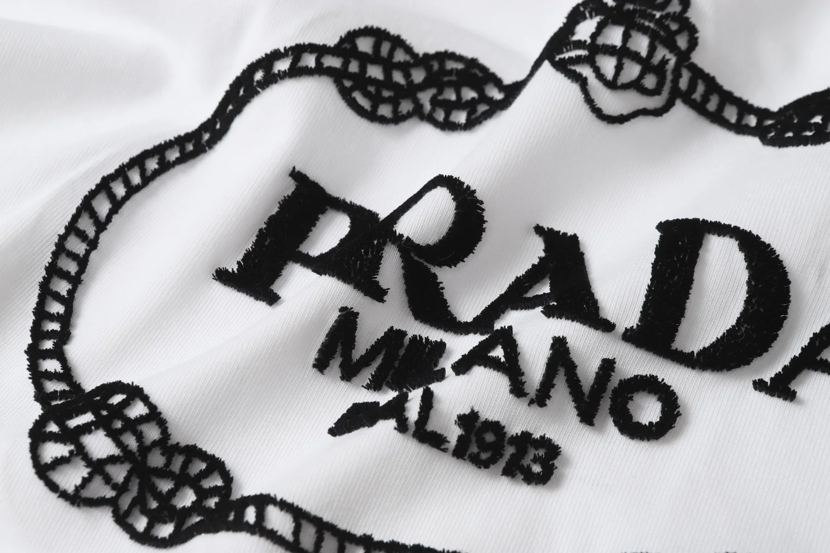 Embroidered flocked cotton T-shirt