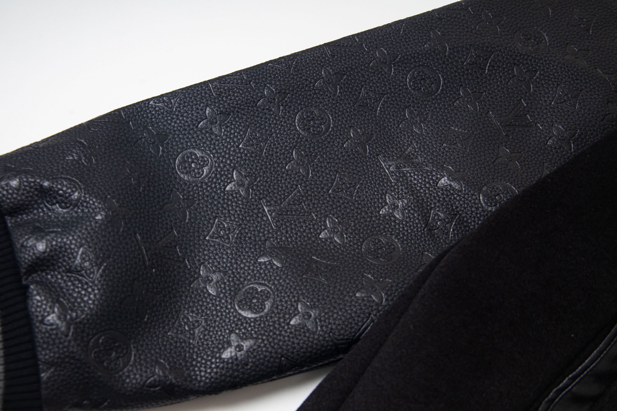 leather-paneled baseball jacket