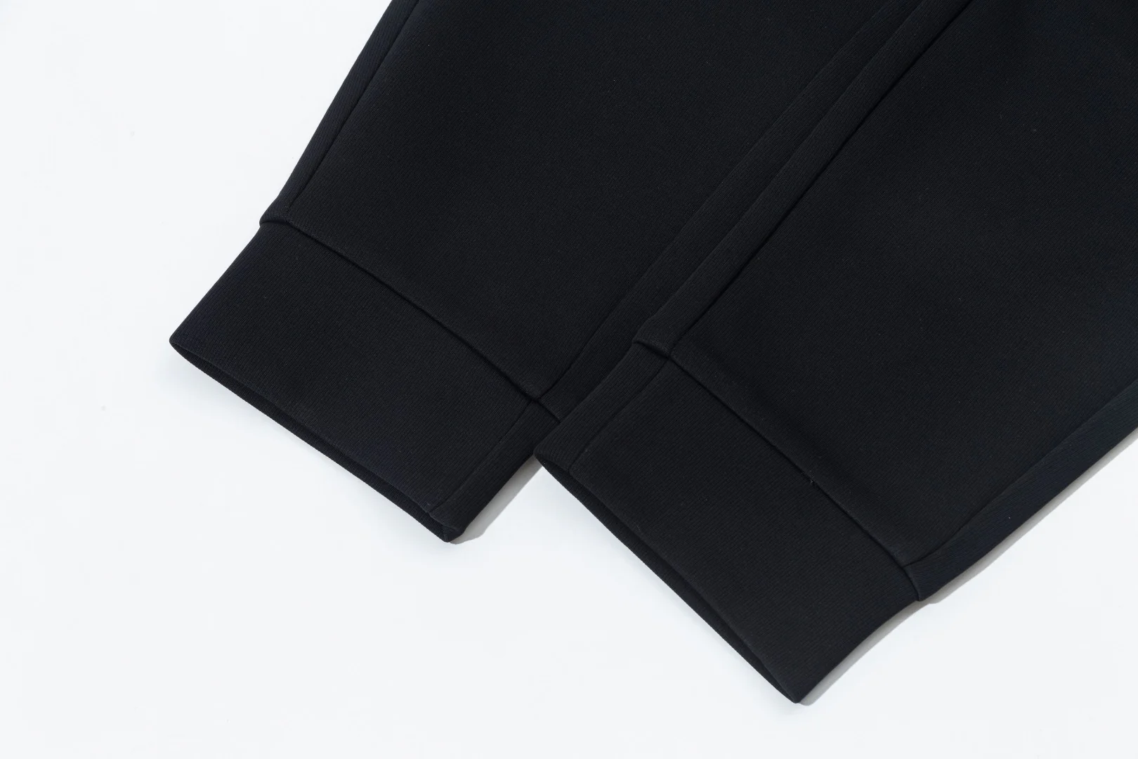 Leather monogram cotton drawstring trousers