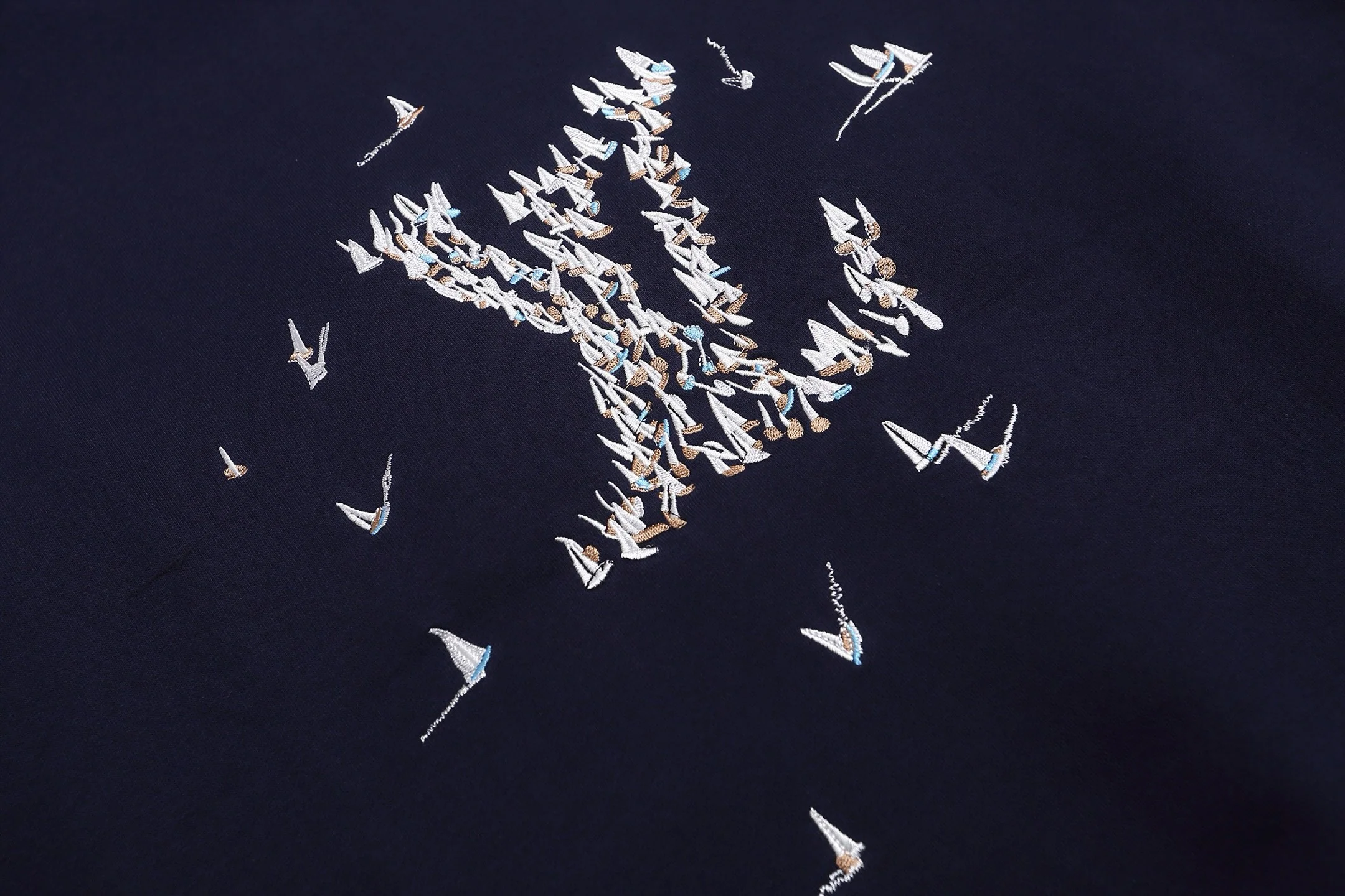 Embroidered sailboat hooded sweatshirt