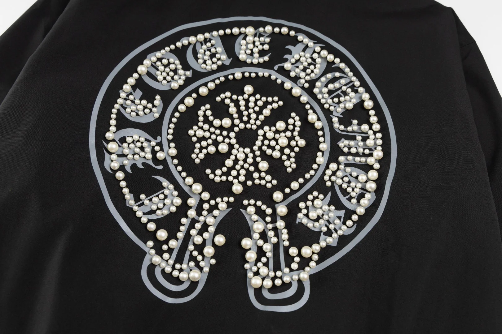 Fashionable embroidered pearl baseball jacket