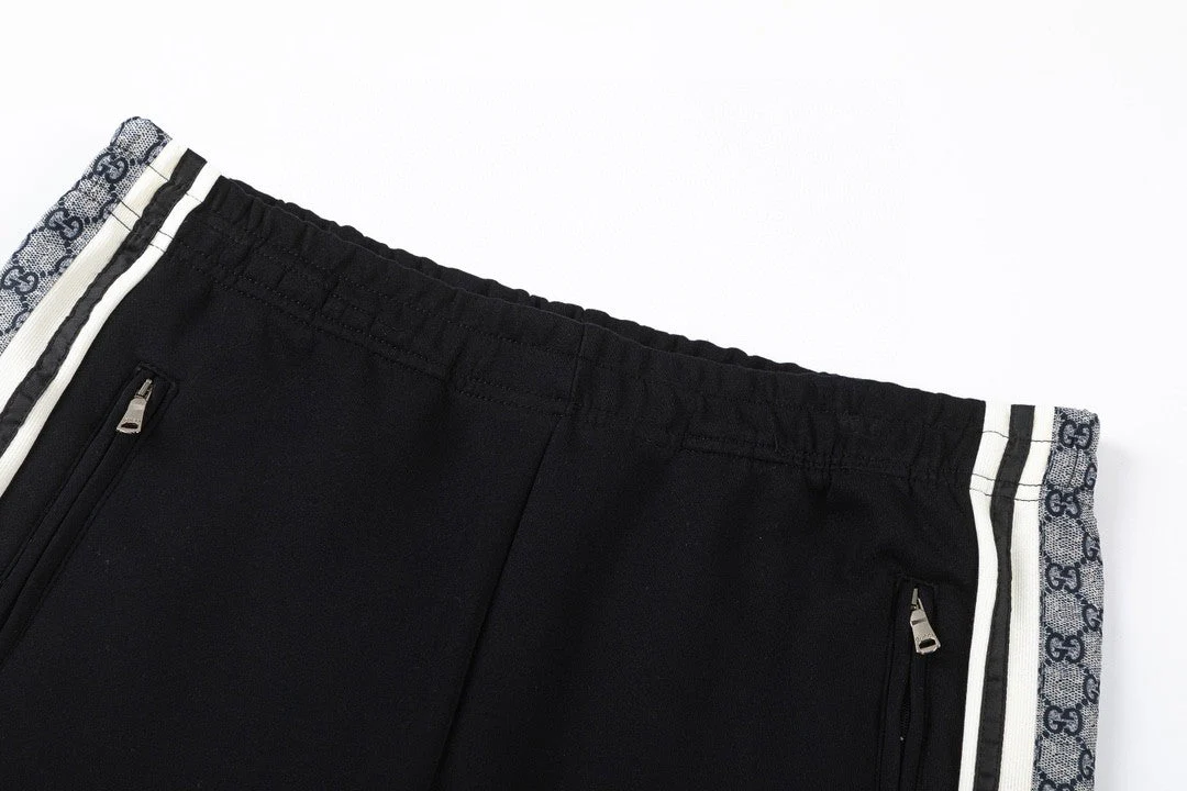 Snake-print webbing trousers