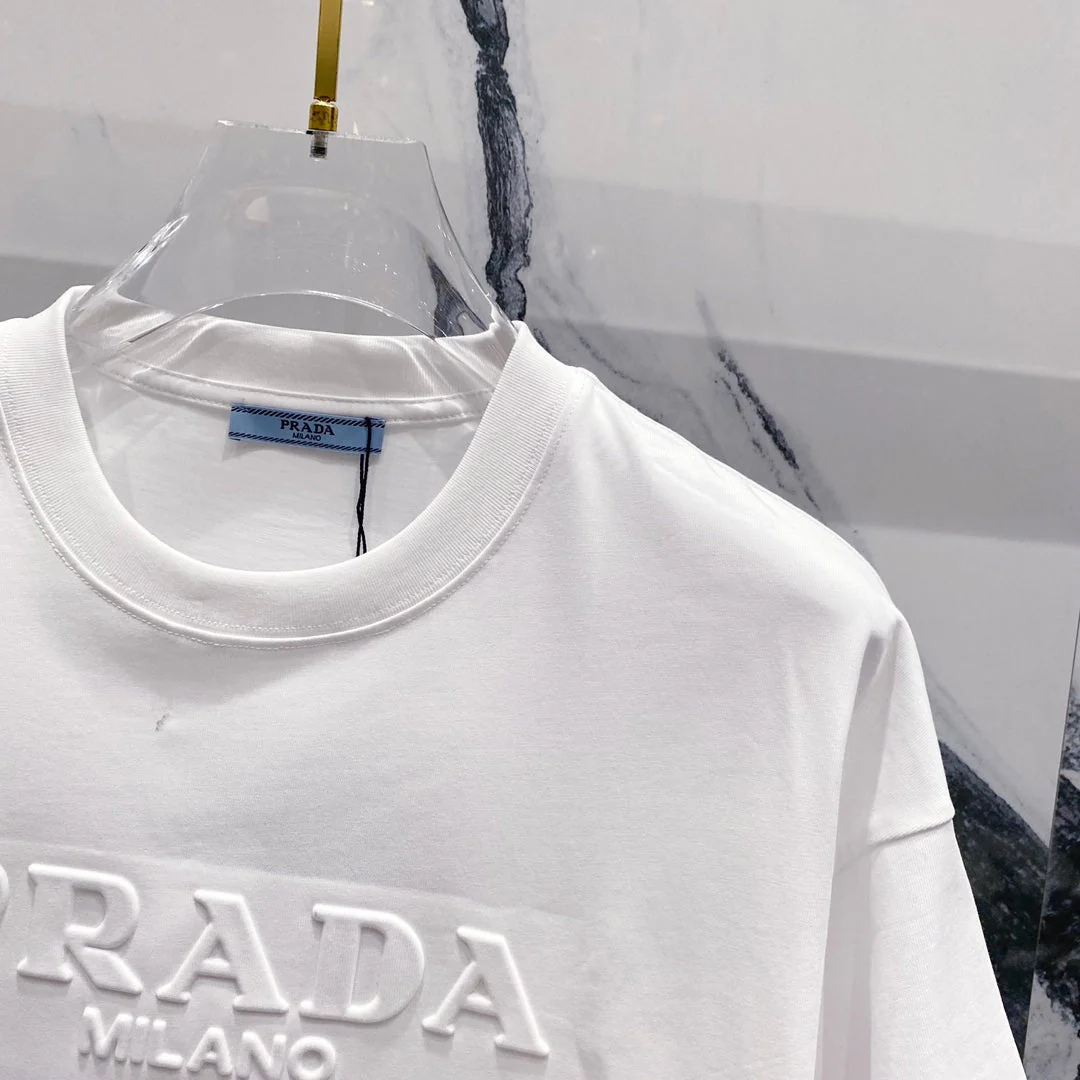 Three-dimensional embossed letter T-shirt