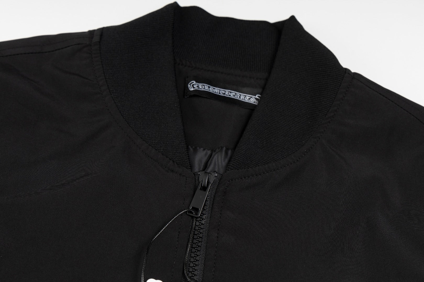 Fashionable embroidered pearl baseball jacket