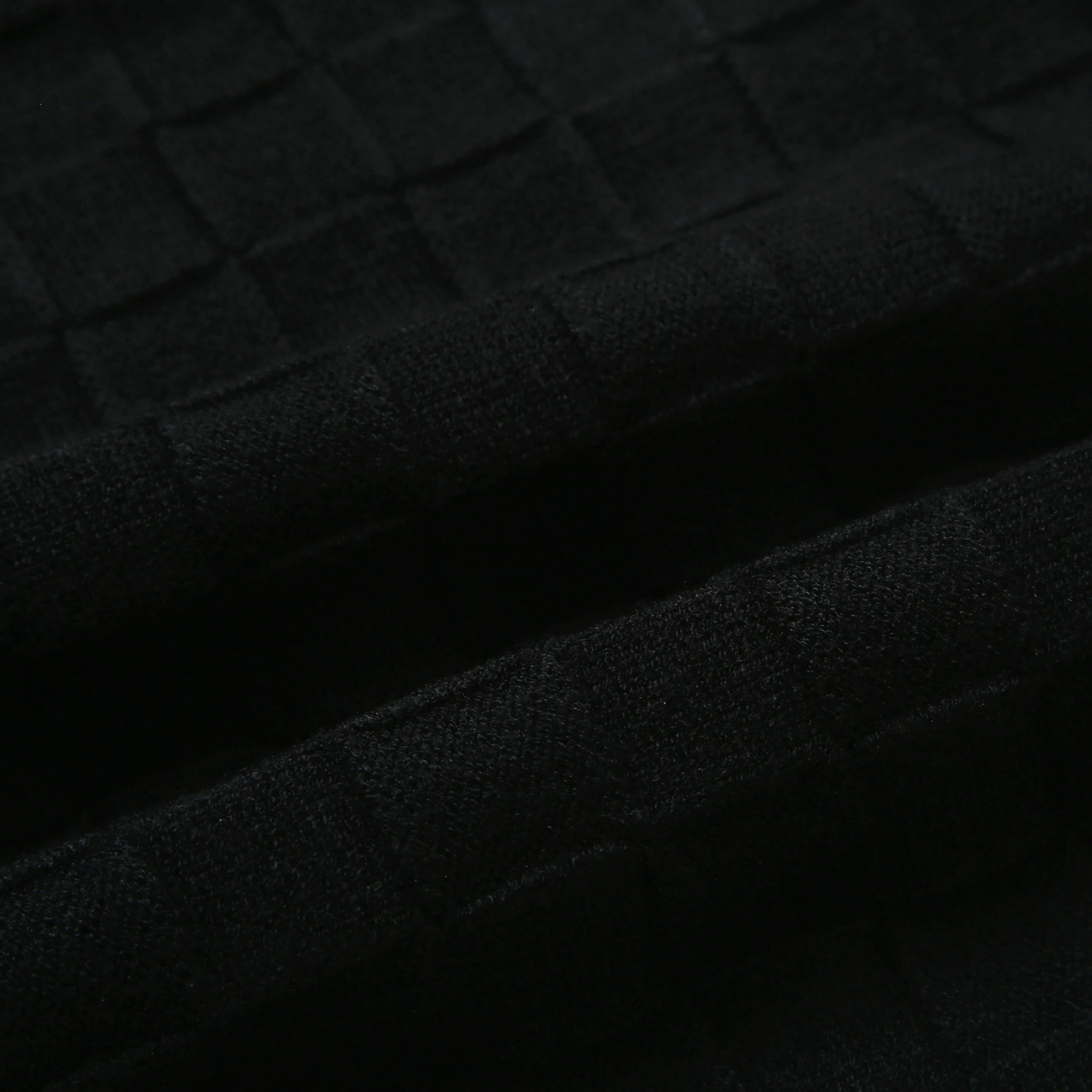 Checkerboard embossed zipper sweater