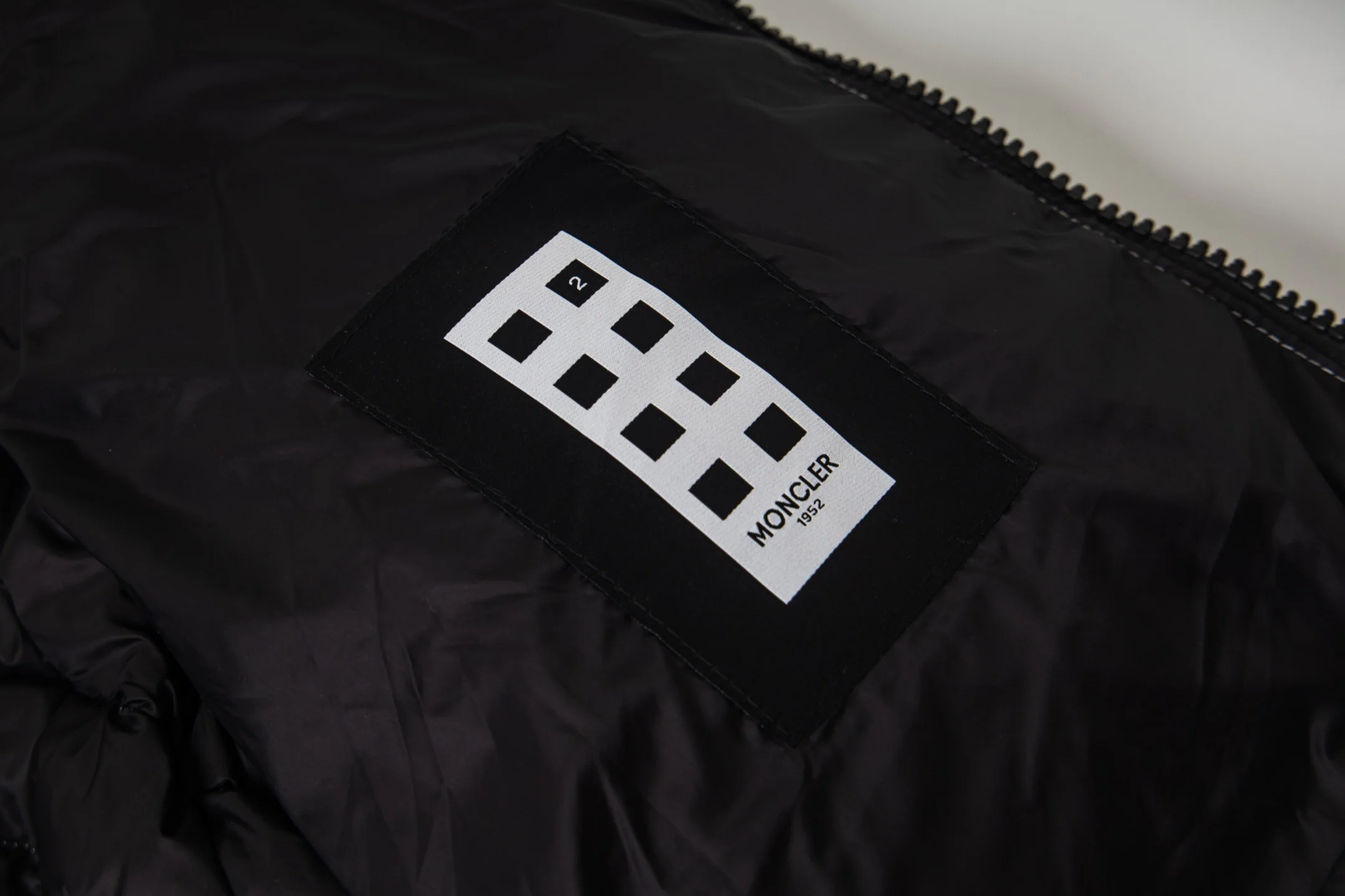 Printed rubber hooded down jacket