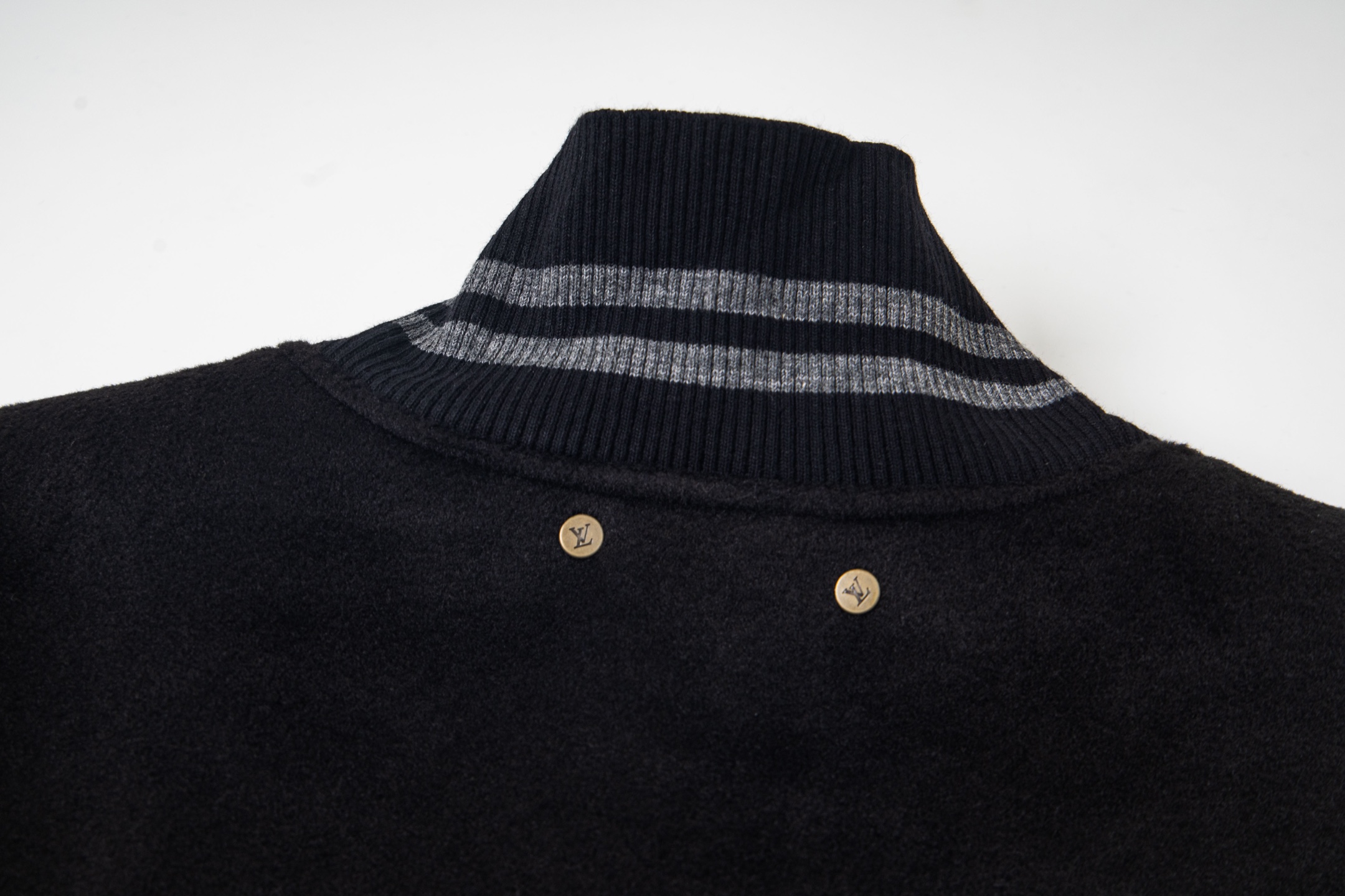 leather-paneled baseball jacket