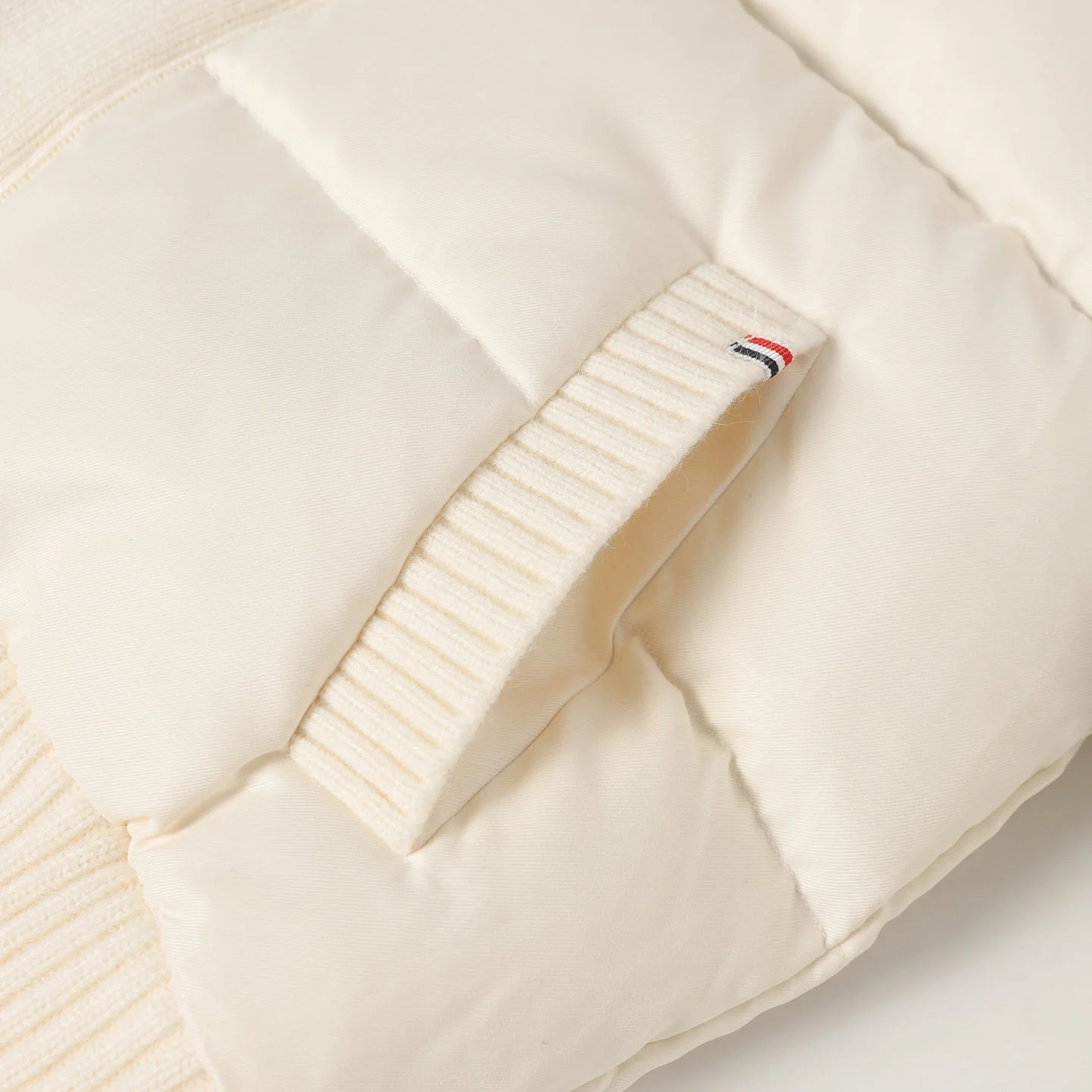 Knitted stand collar down jacket