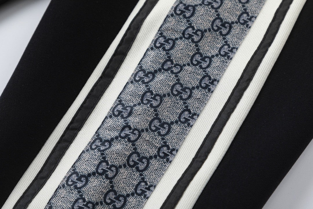 Snake-print webbing trousers