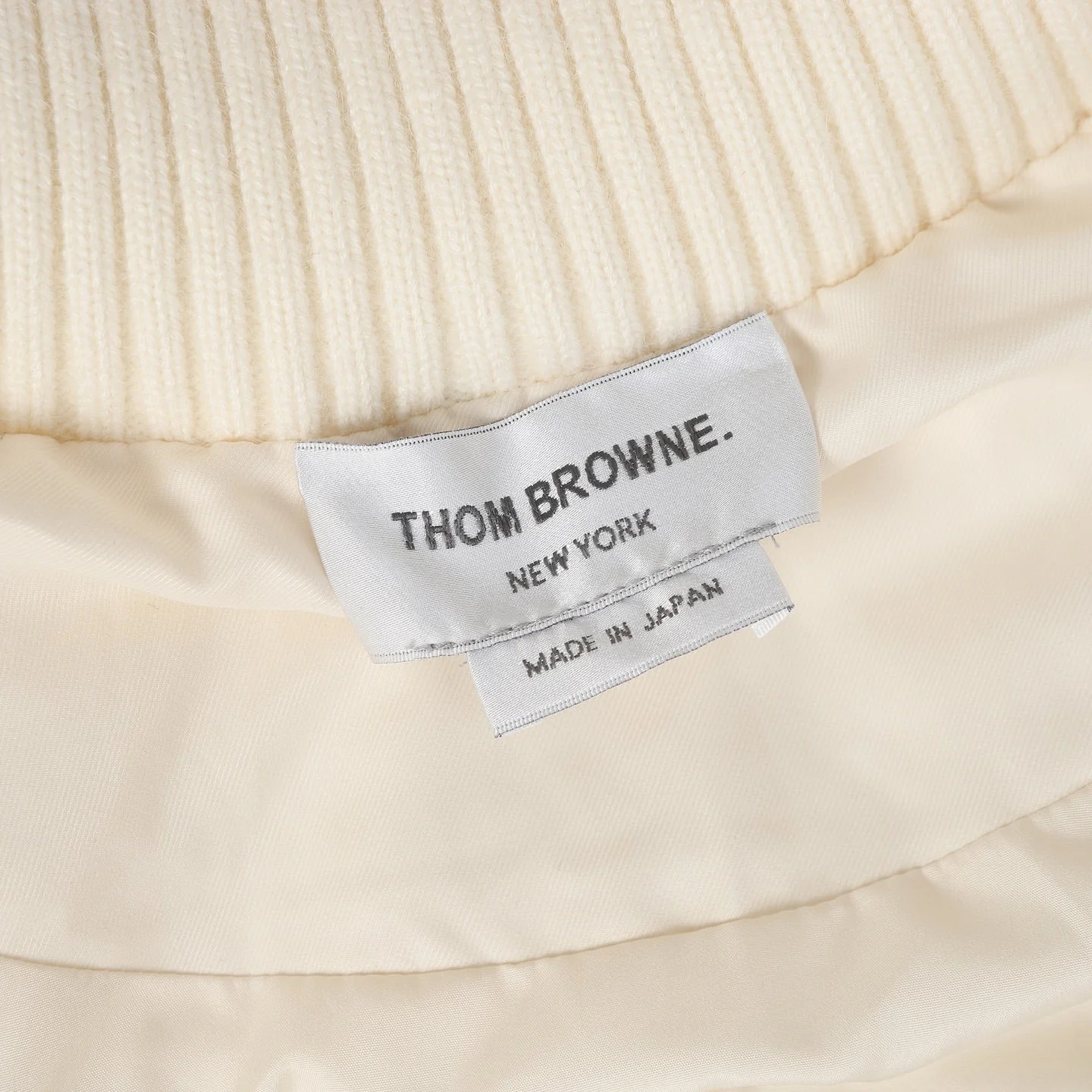 Knitted stand collar down jacket