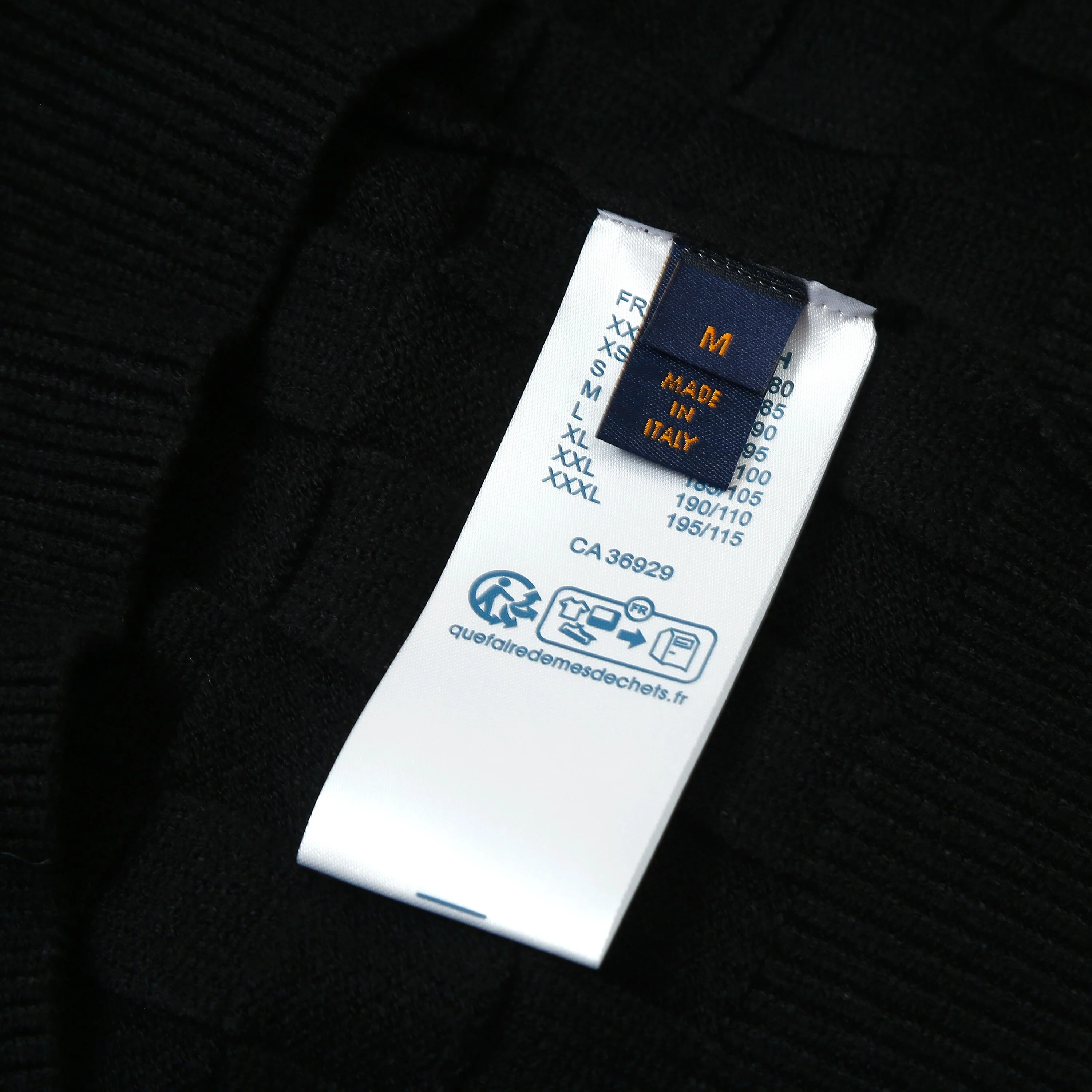 Checkerboard embossed zipper sweater