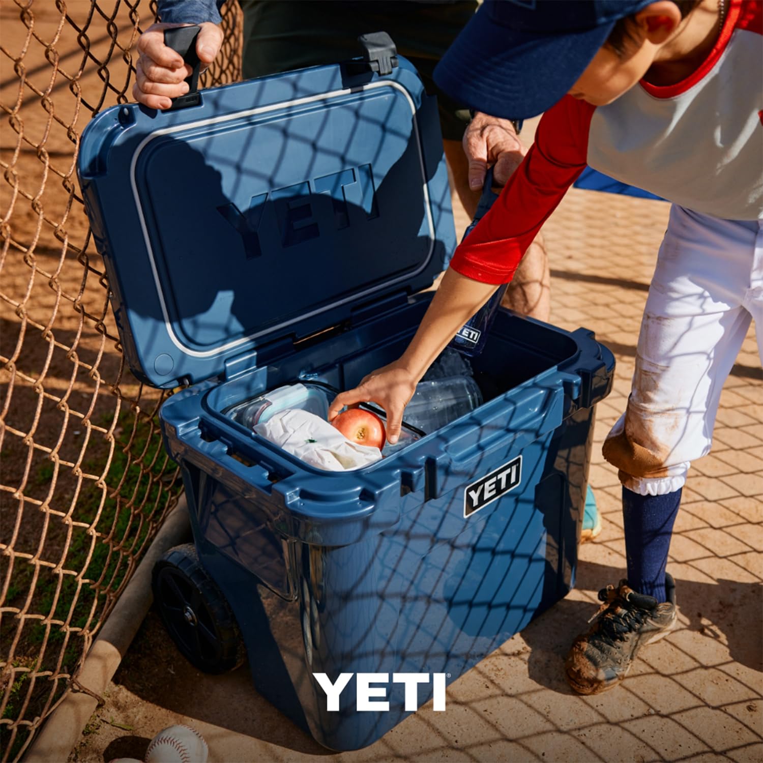 YETI Roadie 32 Wheeled Cooler  Roll to tailgates, tournaments, and camping trips.