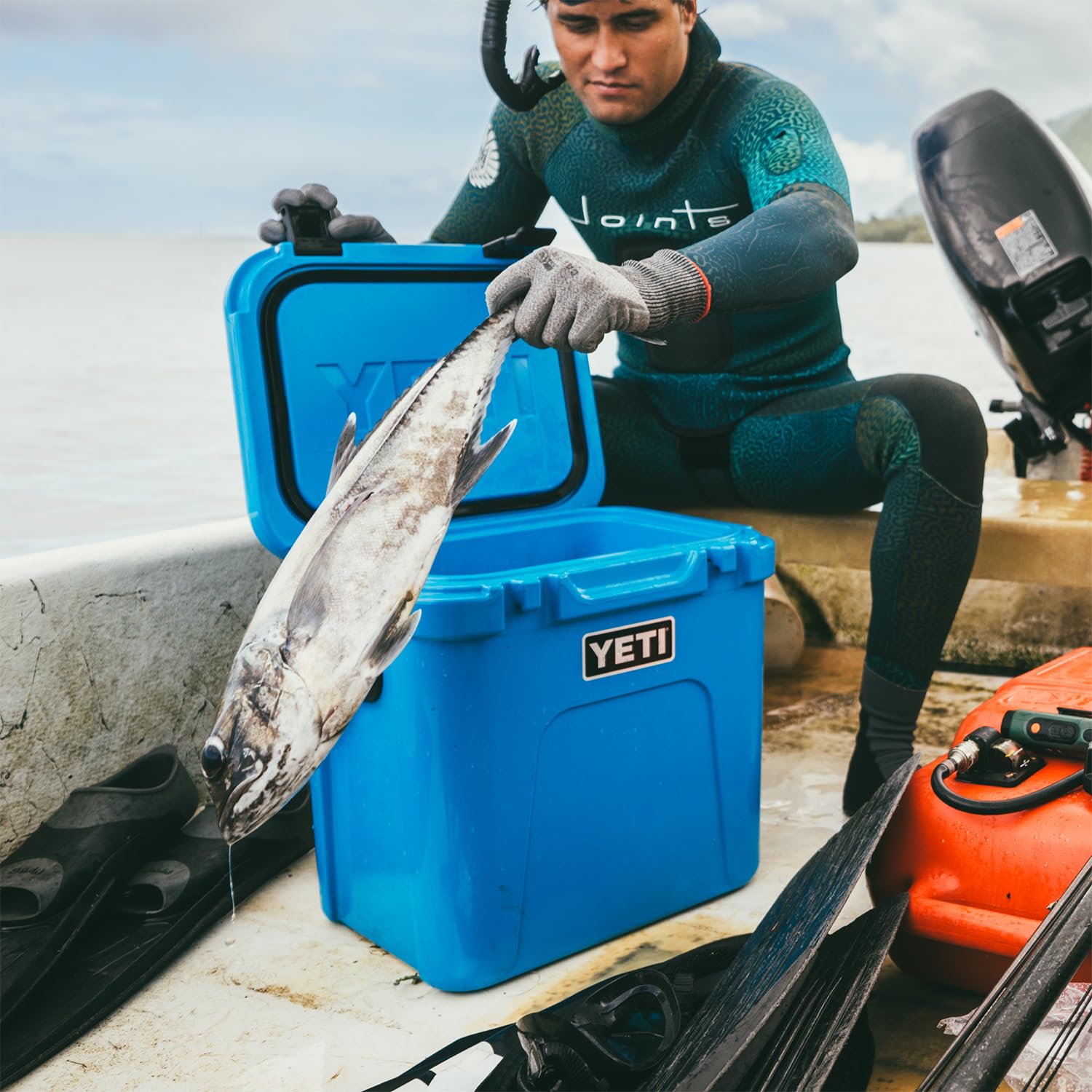 YETI Roadie 24 Cooler Tall enough to chill most bottles of wine and keep the essentials fresh while you take the scenic route.